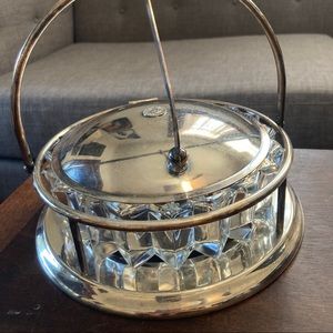 This unique serving piece is a cut glass (crystal?)